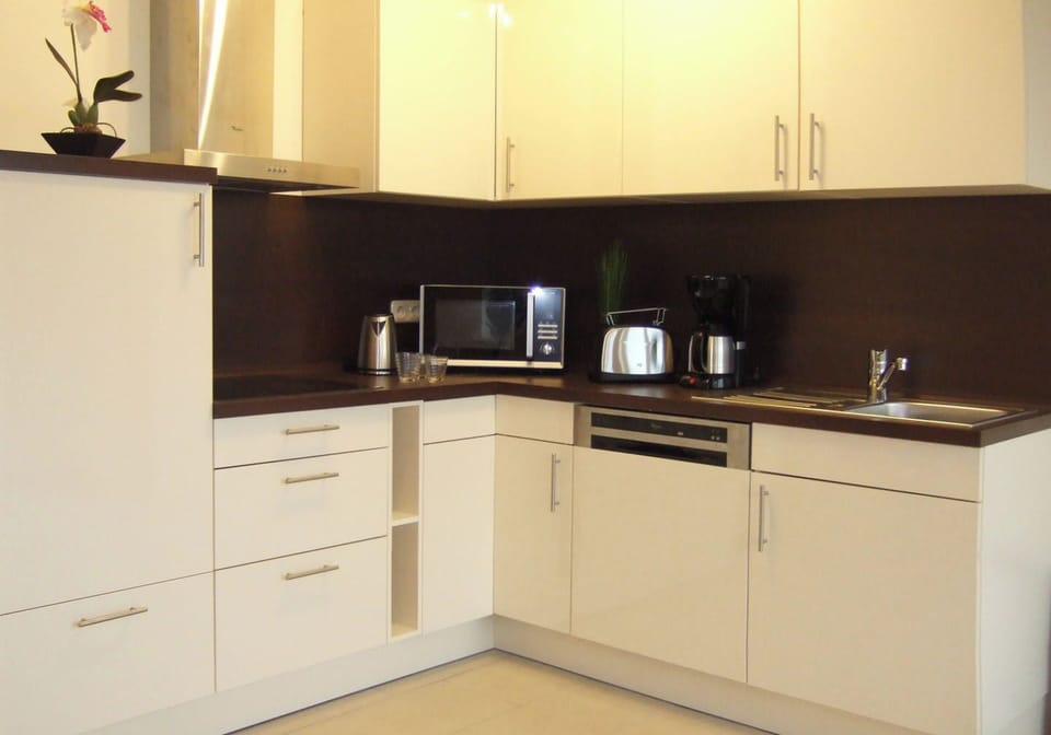 Comfort Suite, Balcony | Private kitchen