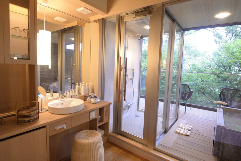 Japanese+Western Style Room KOU/MAN, Garden Deck, Outdoor Bath | Bathroom | Separate tub and shower, spring water tub, free toiletries, hair dryer