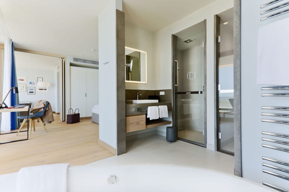 Suite, Sea View | Bathroom | Rainfall showerhead, free toiletries, hair dryer, bathrobes