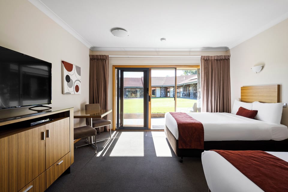 Twin Room | Pillowtop beds, desk, laptop workspace, soundproofing