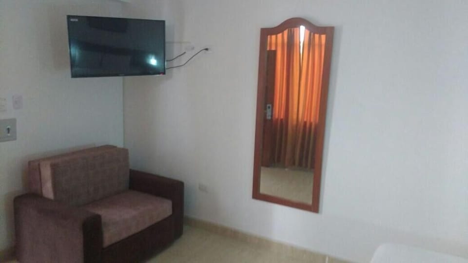 42-inch flat-screen TV with cable channels, TV
