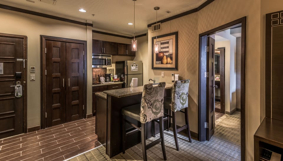 Suite, 1 Bedroom, Kitchen | Private kitchen | Full-size fridge, microwave, stovetop, dishwasher