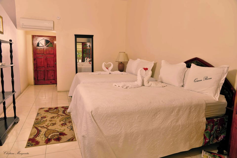 Premium bedding, Tempur-Pedic beds, desk, laptop workspace