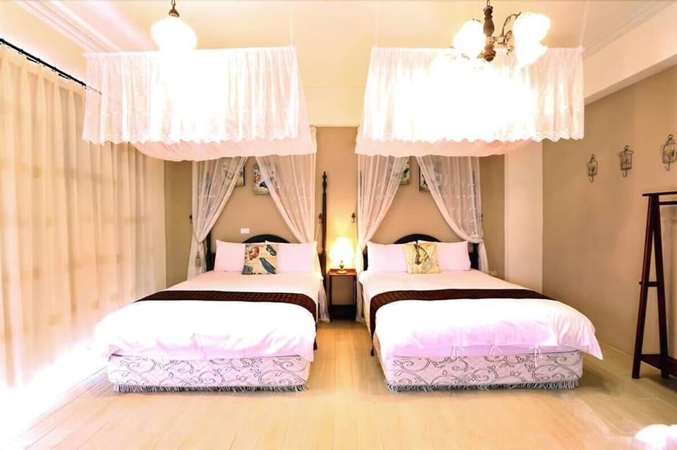 Standard Quadruple Room | Desk, blackout drapes, soundproofing, free WiFi