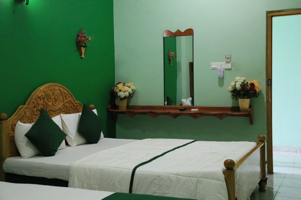 Family Triple Room, City View | 14 bedrooms, premium bedding, desk, soundproofing