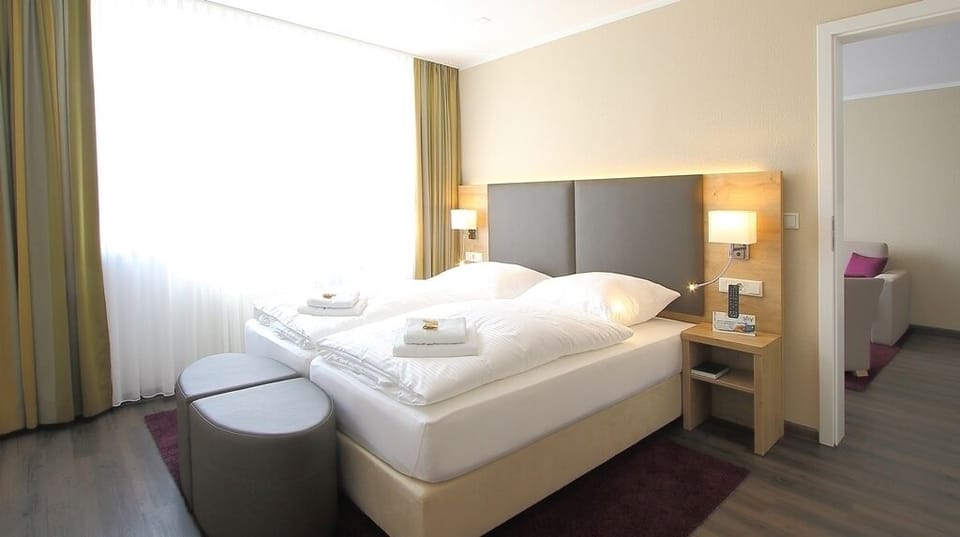 Family Room, Garden View | Desk, free WiFi, bed sheets