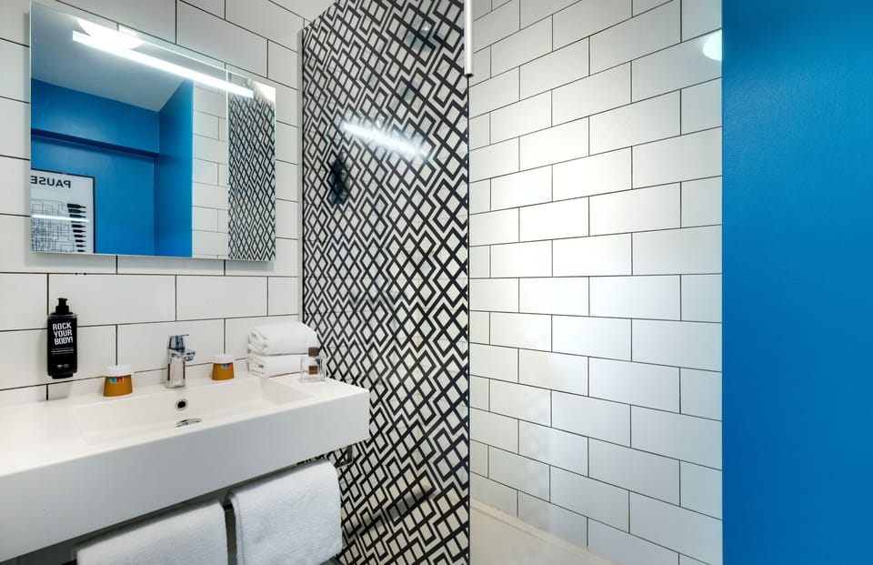 Standard Double Room, 1 Double Bed | Bathroom | Eco-friendly toiletries, hair dryer, towels