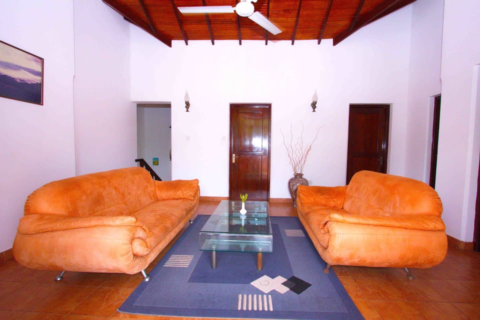 Triple Room, Accessible, Pool View | Living area | Flat-screen TV
