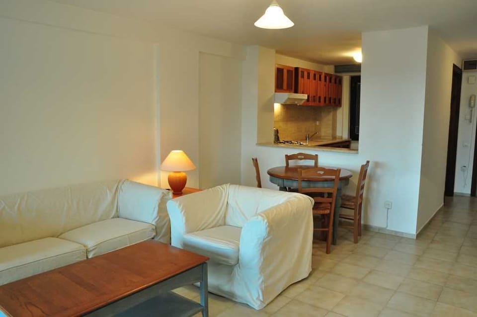 Standard Suite | Living area | Flat-screen TV