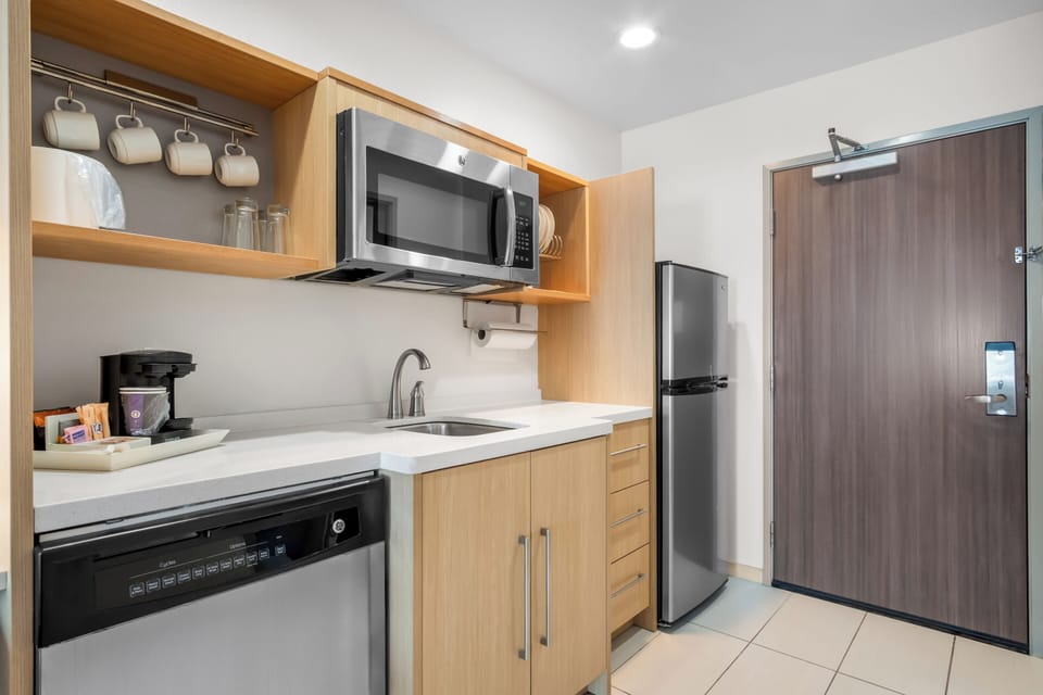 Desk, laptop workspace, cribs (free), WiFi (free)