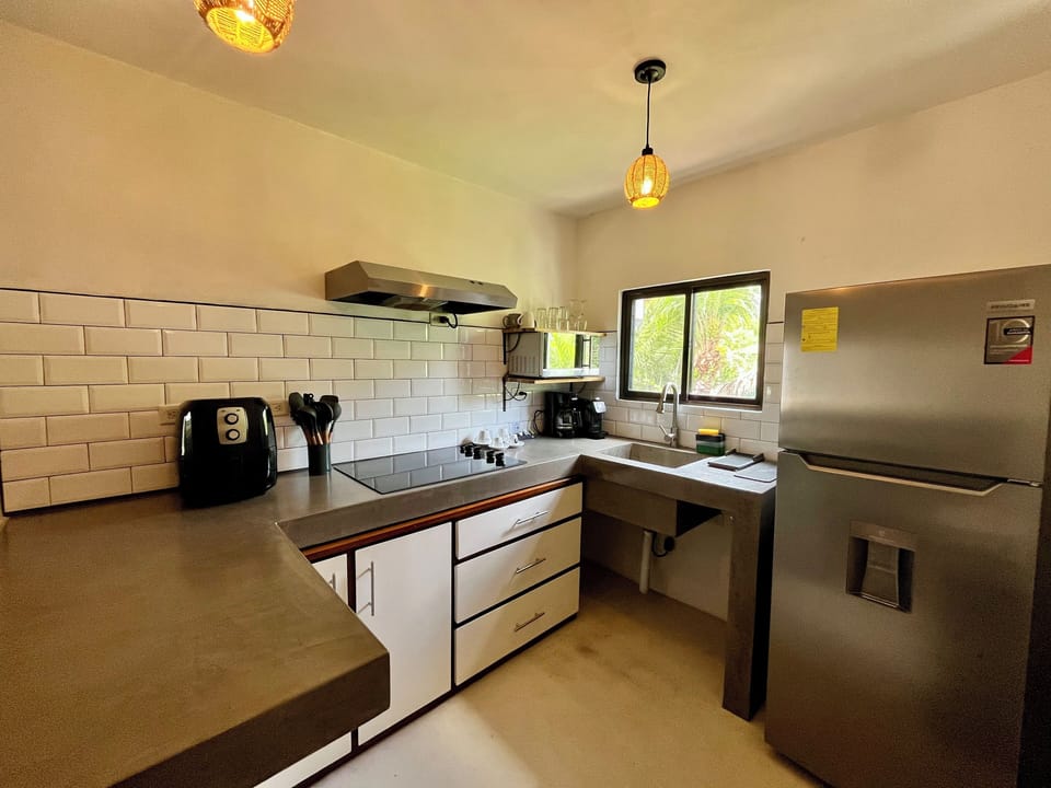 Deluxe Villa | Private kitchen | Fridge