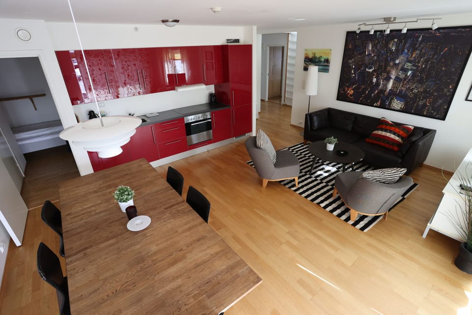 Quadruple Room | Living area | Flat-screen TV