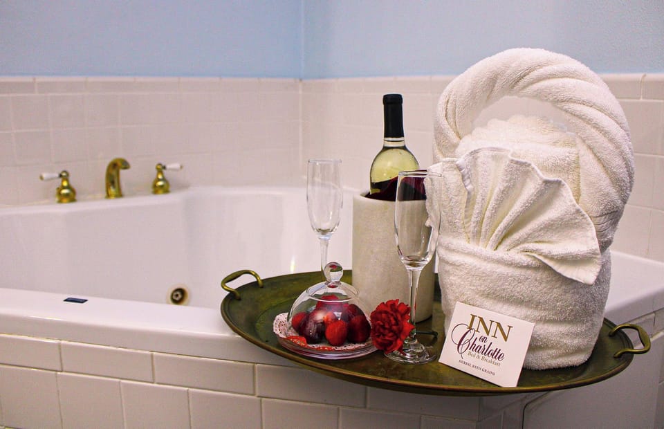 Superior Room, 1 King Bed, Ground Floor | Bathroom | Separate tub and shower, jetted tub, hair dryer, soap