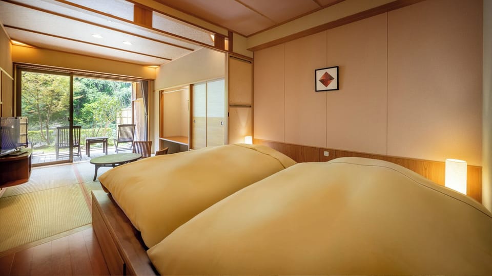 Deluxe Room with Tatami Area & Open-Air Bath, Non Smoking | Minibar (free items), in-room safe, bed sheets