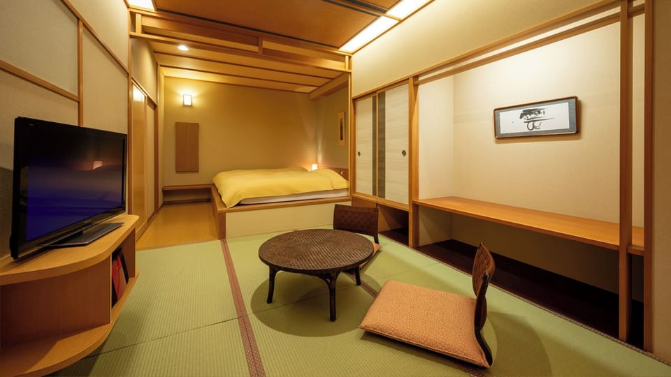 Standard Room with Tatami Area & Open-Air Bath, Non Smoking | Minibar (free items), in-room safe, bed sheets