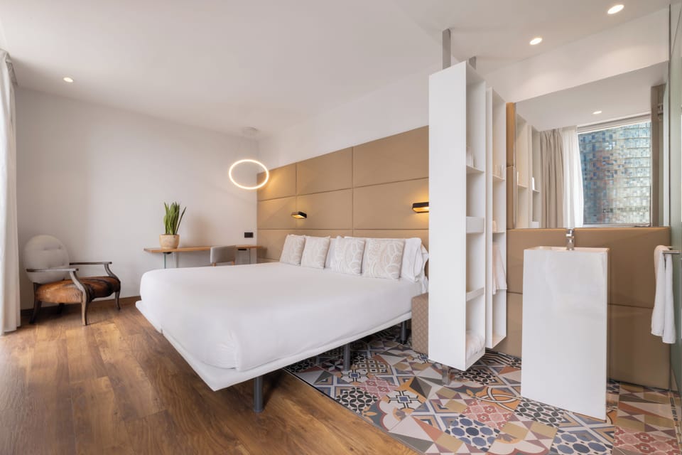 Double Room Glòries Tower view | Hypo-allergenic bedding, minibar, in-room safe, desk