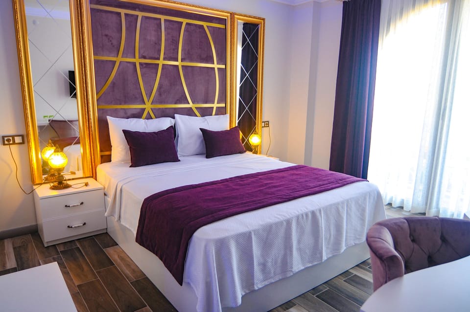 Egyptian cotton sheets, premium bedding, minibar, in-room safe