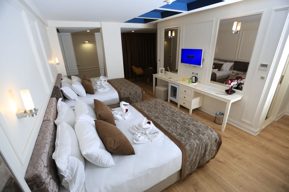 Standard Suite | Premium bedding, minibar, in-room safe, desk