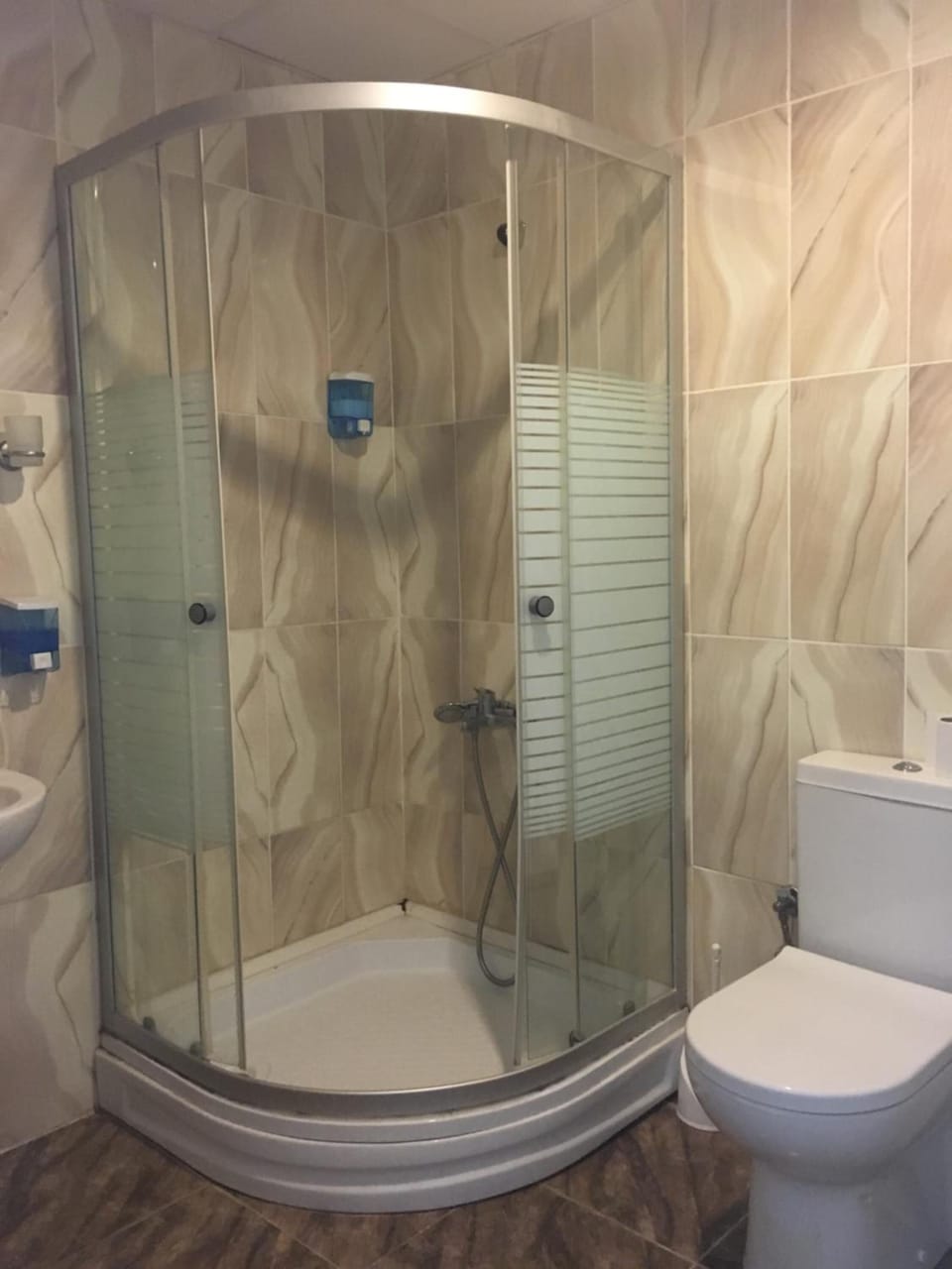 Shower, free toiletries, hair dryer, slippers