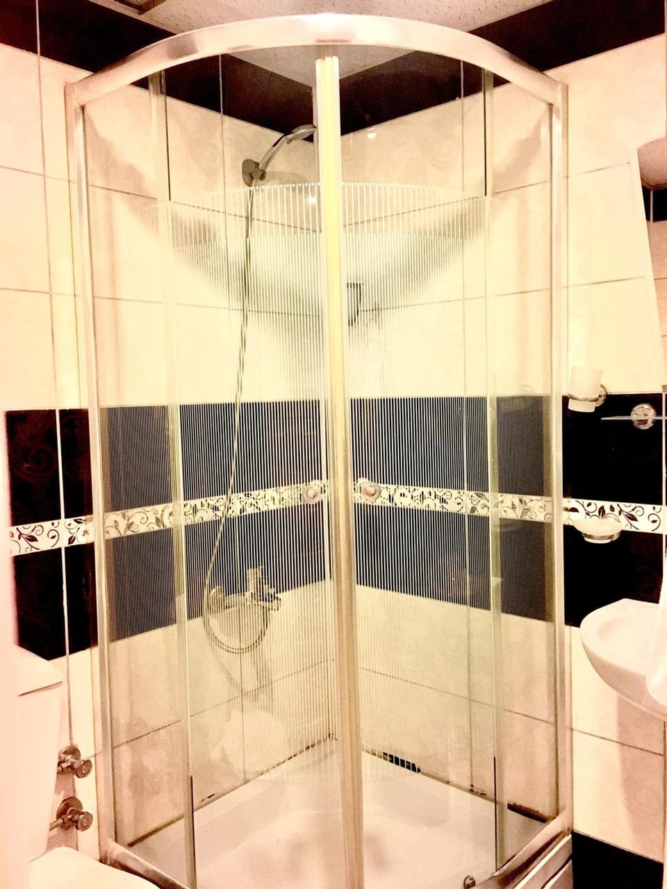 Shower, free toiletries, hair dryer, slippers