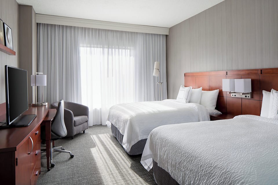 Premium bedding, pillowtop beds, desk, iron/ironing board