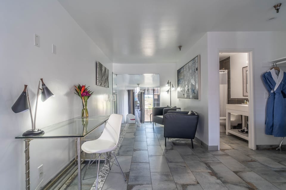 Premium Suite, 1 King Bed, Private Pool (Adults Only) | In-room safe, individually decorated, desk, laptop workspace