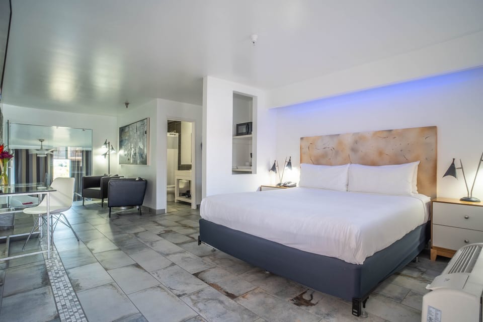 Premium Suite, 1 King Bed, Private Pool (Adults Only) | In-room safe, individually decorated, desk, laptop workspace