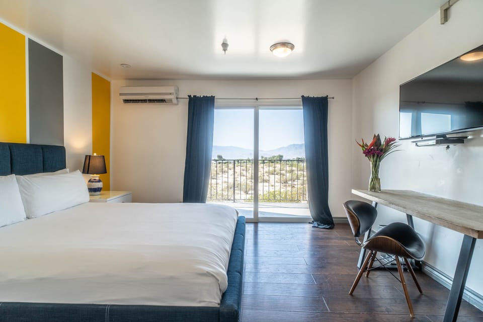 Suite, 1 King Bed, Kitchenette, Mountain View | In-room safe, individually decorated, desk, laptop workspace