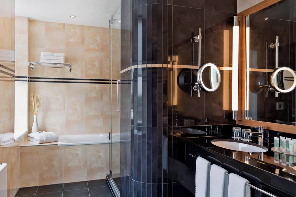 Junior Room, 1 Bedroom (View) | Bathroom | Free toiletries, hair dryer, towels