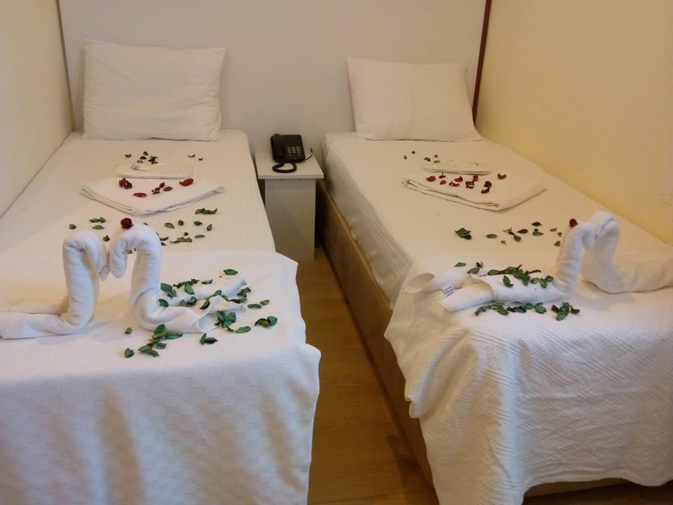Double or Twin Room | Desk, WiFi (free), bed sheets