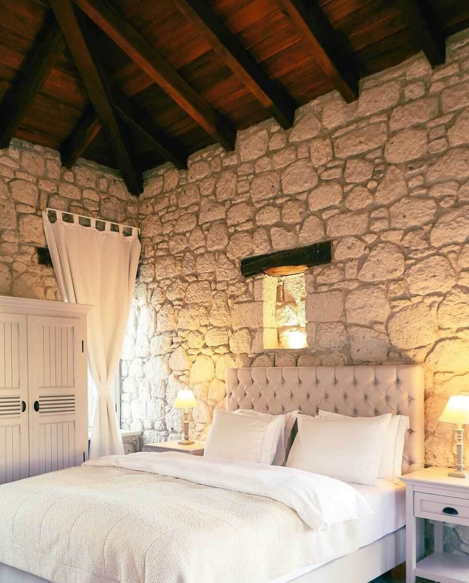 Signature Double Room, Pool View | Minibar, in-room safe, iron/ironing board, free WiFi