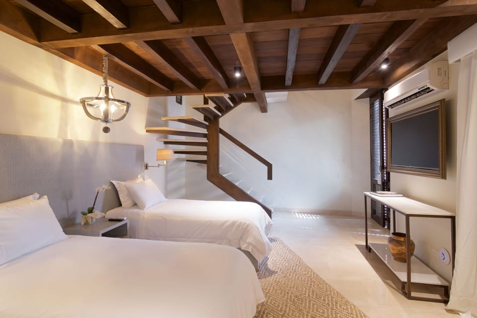 Family Suite, 2 Bedrooms, 2 Bathrooms | Premium bedding, down comforters, in-room safe, individually decorated