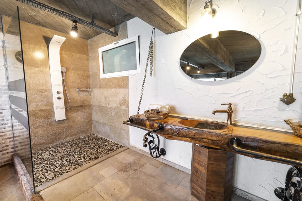Design Double Room | Bathroom | Designer toiletries, hair dryer, bathrobes, slippers