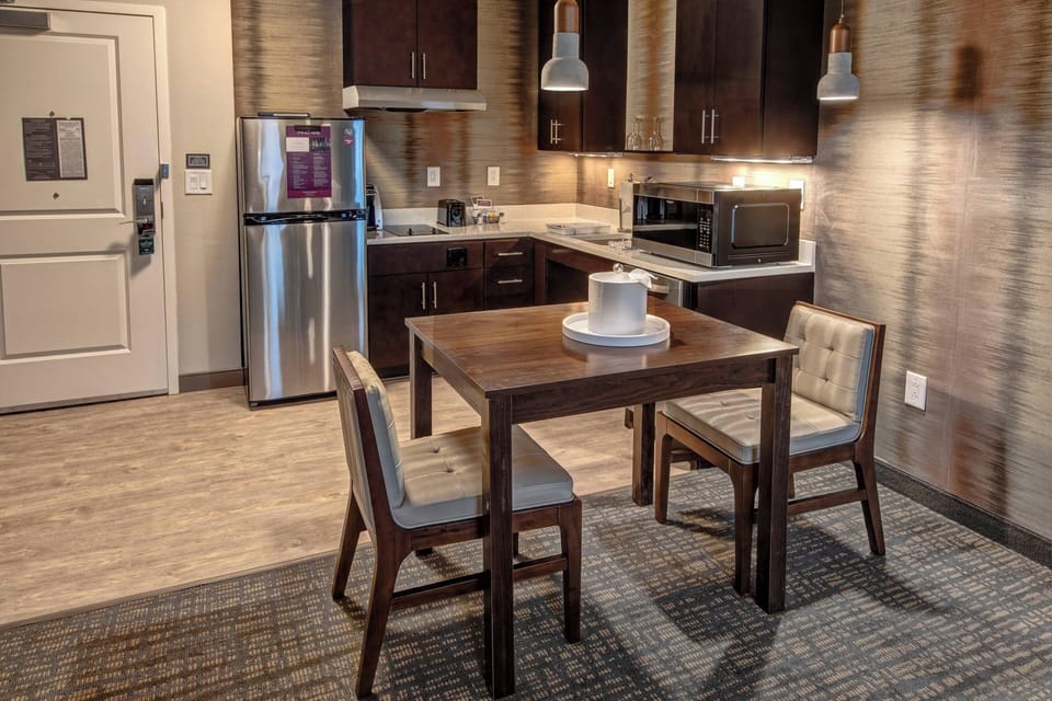 Studio, 2 Queen Beds | Private kitchen | Full-size fridge, microwave, stovetop, dishwasher