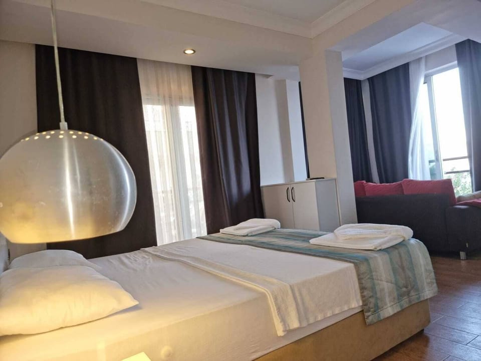 Minibar, laptop workspace, bed sheets