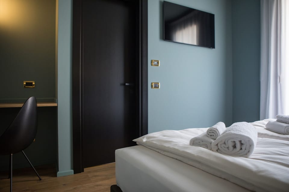 Double or Twin Room, Balcony | In-room safe, desk, free WiFi, bed sheets