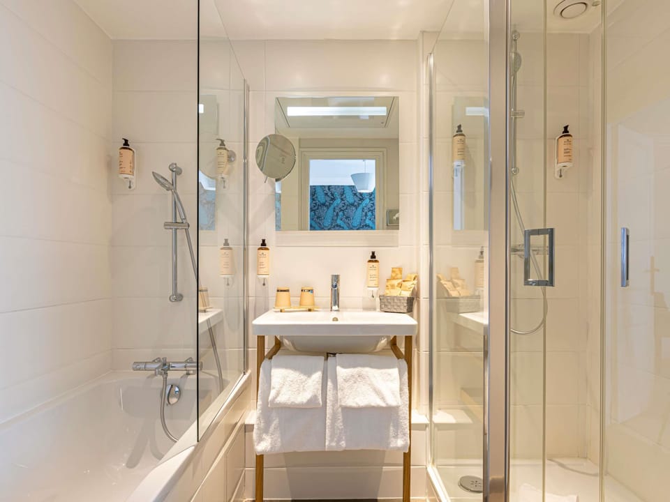 Eco-friendly toiletries, hair dryer, towels