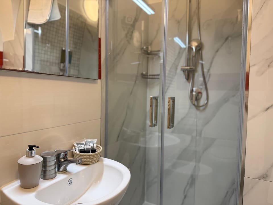 Shower, free toiletries, hair dryer, towels