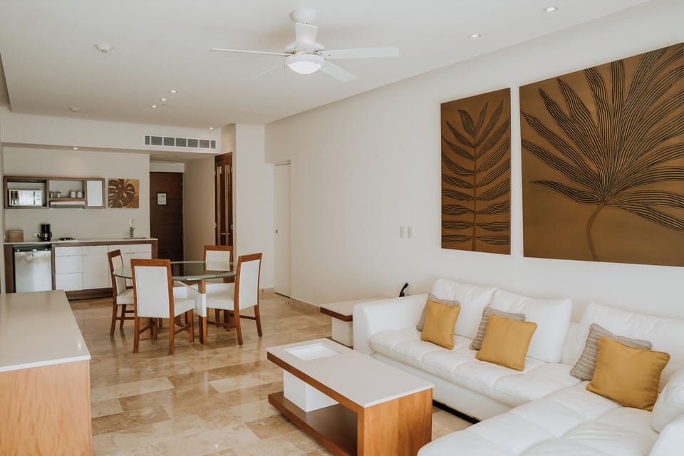 Luxurious Master Suite | Living area | 50-inch flat-screen TV with cable channels, TV, iPod dock