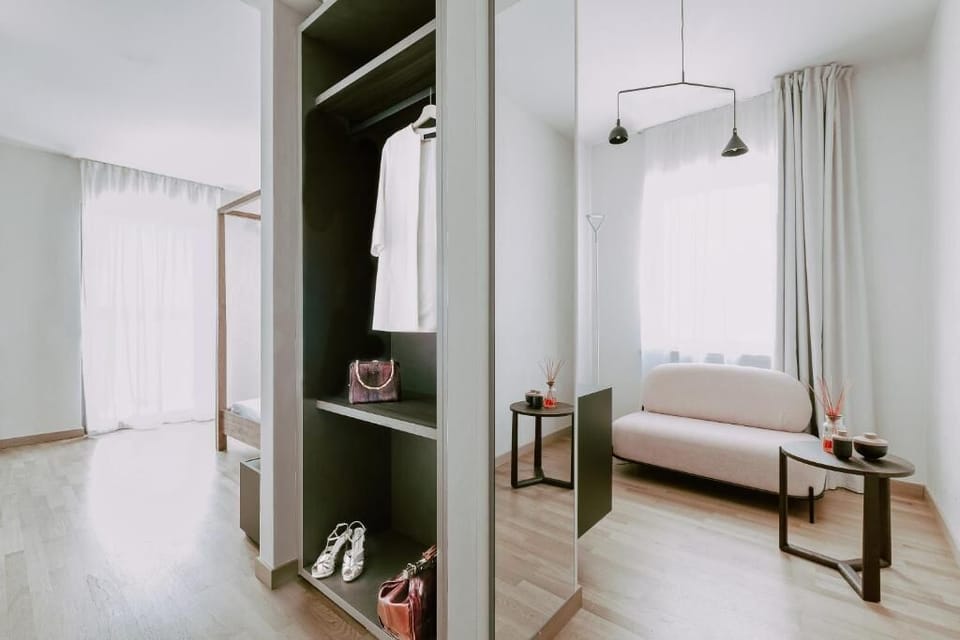 Deluxe Room, 1 Queen Bed, Balcony, Lake View | In-room safe, individually decorated, individually furnished