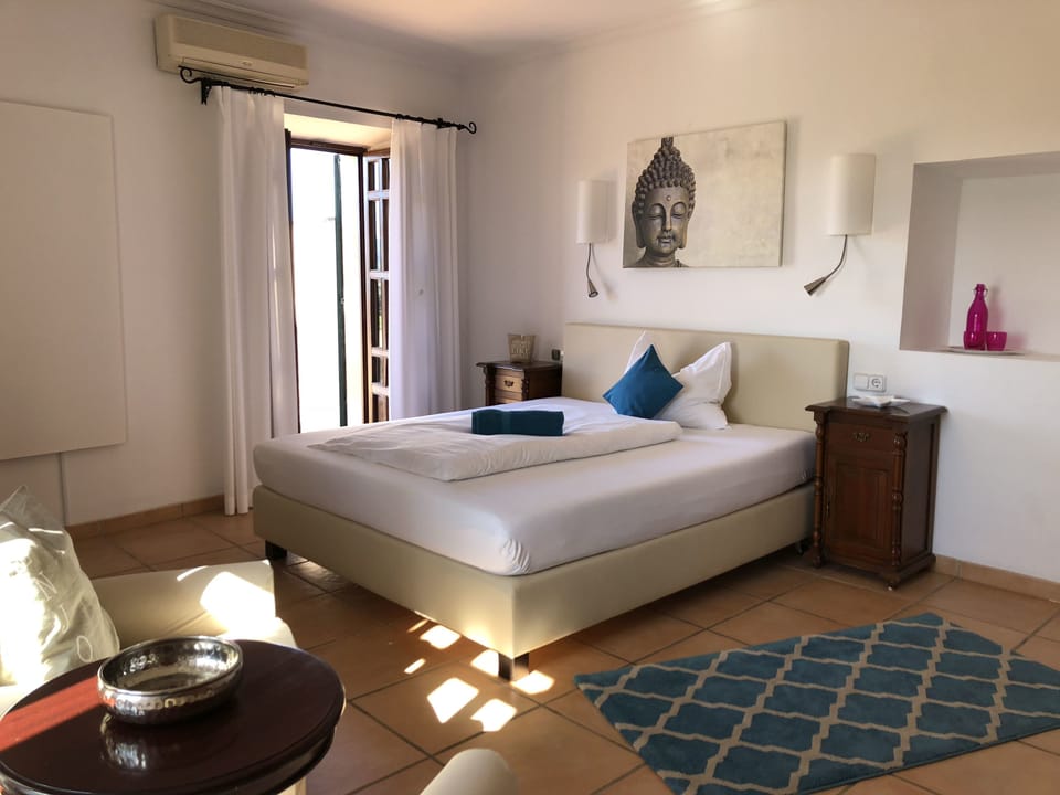Double Room, Terrace | Minibar, in-room safe, individually decorated, individually furnished