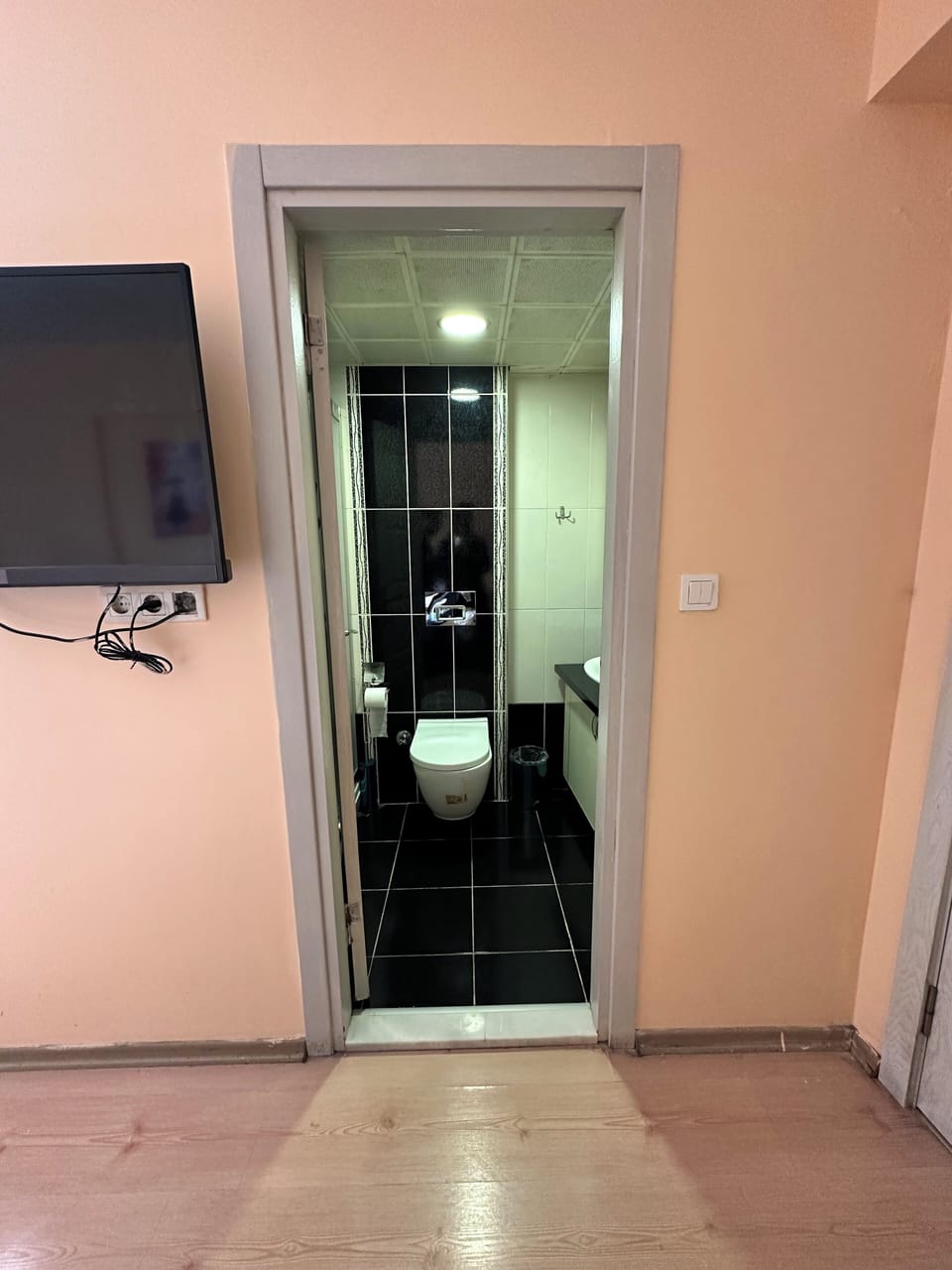 Shower, free toiletries, hair dryer, slippers