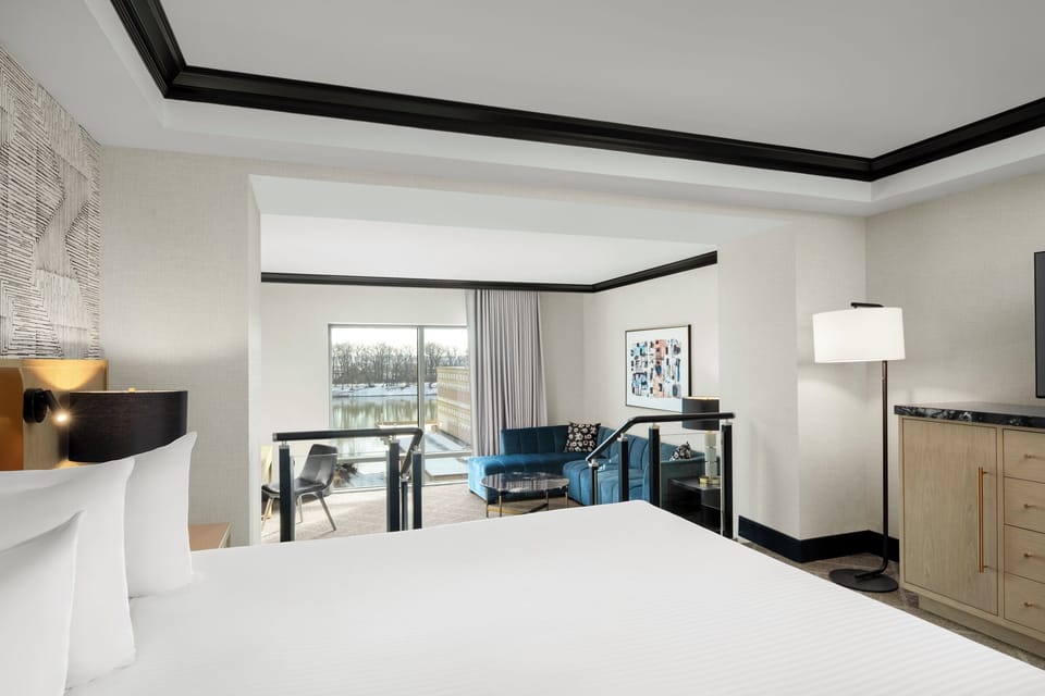 Premium Suite | Living area | 37-inch flat-screen TV with premium channels, TV, iPod dock