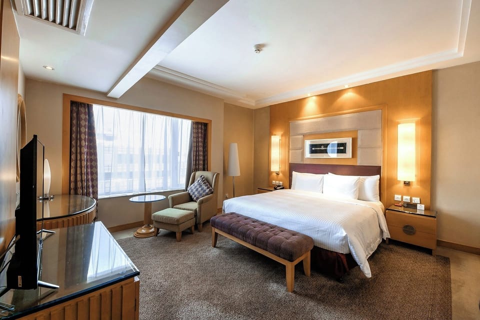Suite, 1 King Bed, Club Lounge Access | Down comforters, minibar, in-room safe, desk