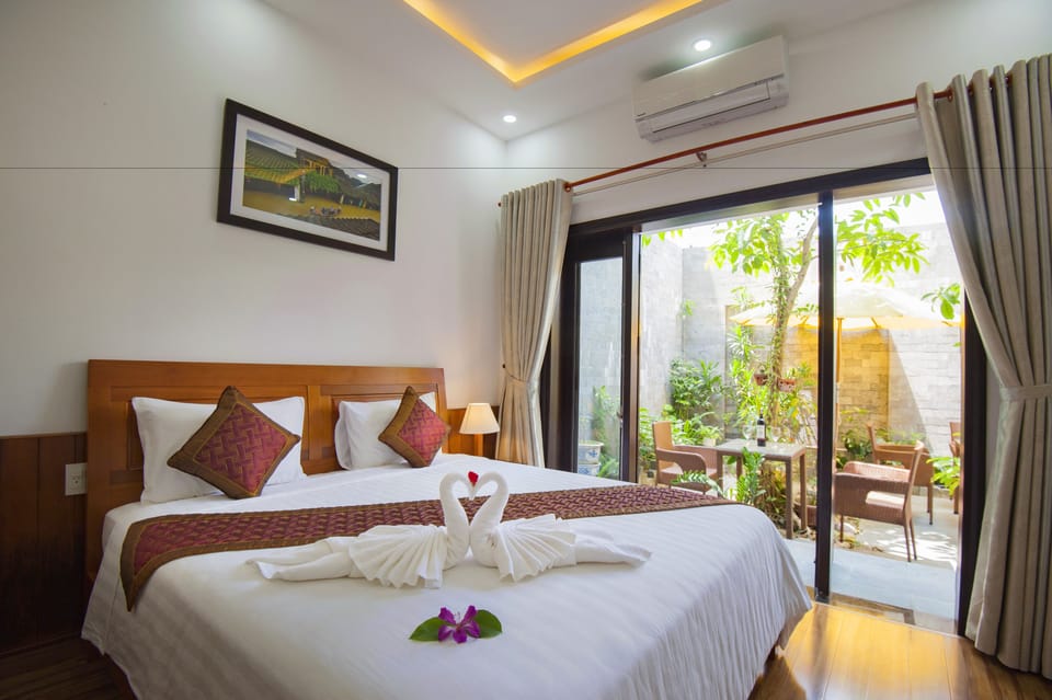 Luxury Double Room, Garden View | Individually furnished, desk, laptop workspace, blackout drapes
