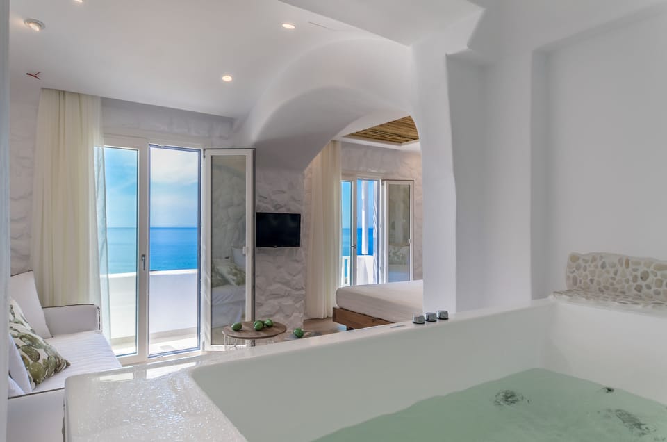 Premium Suite, Jetted Tub, Sea View | Living area | 28-inch LED TV with satellite channels, TV