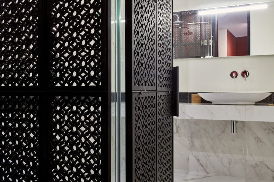 Standard Double Room (Interior Corridor) | Bathroom | Shower, eco-friendly toiletries, hair dryer, slippers