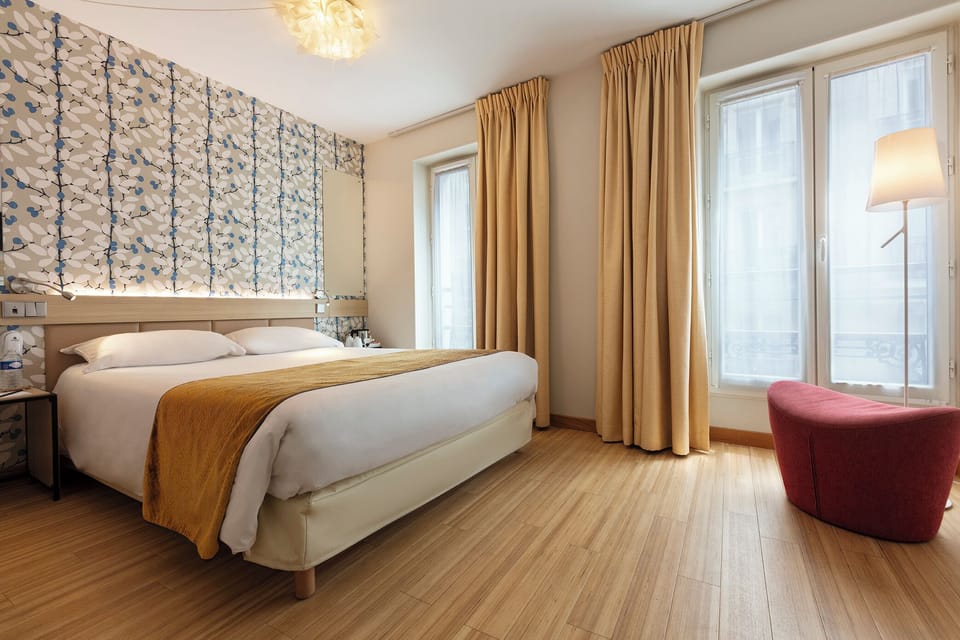 Superior Room | Minibar, in-room safe, individually decorated, individually furnished