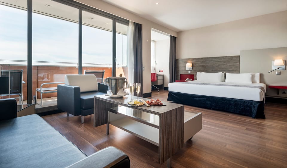 Junior Suite, Terrace | Down comforters, in-room safe, desk, laptop workspace