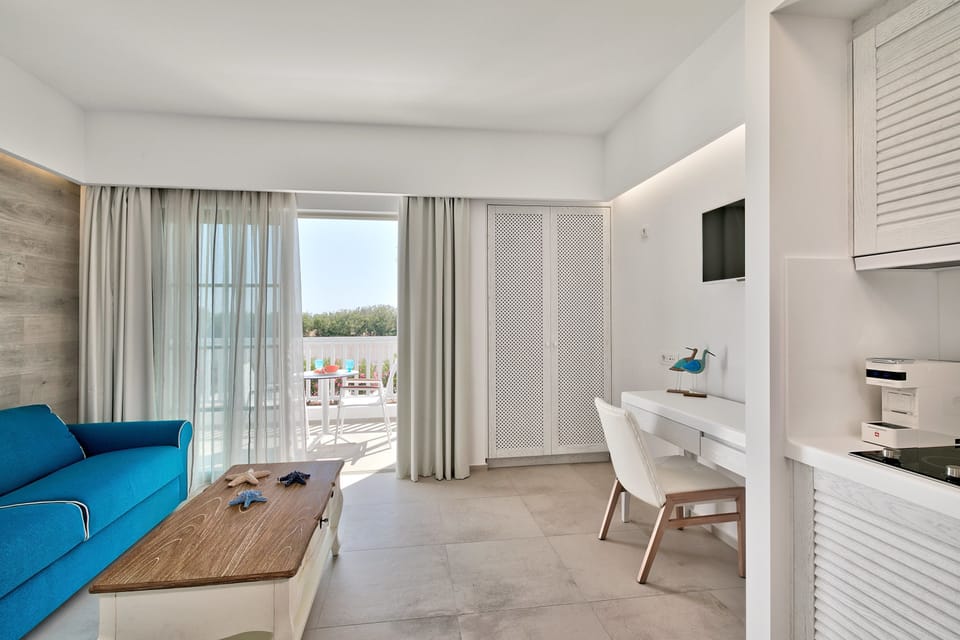 Villa, Garden View (Split Level) | Living room | 32-inch flat-screen TV with cable channels, TV